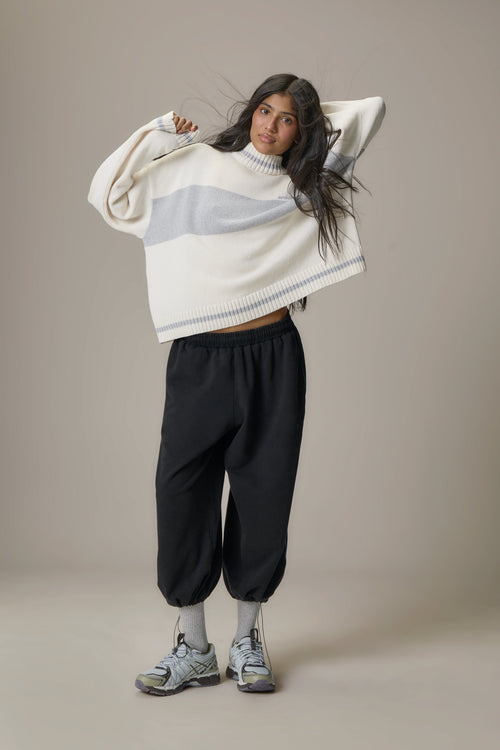 Bebe Roll Neck in Off White